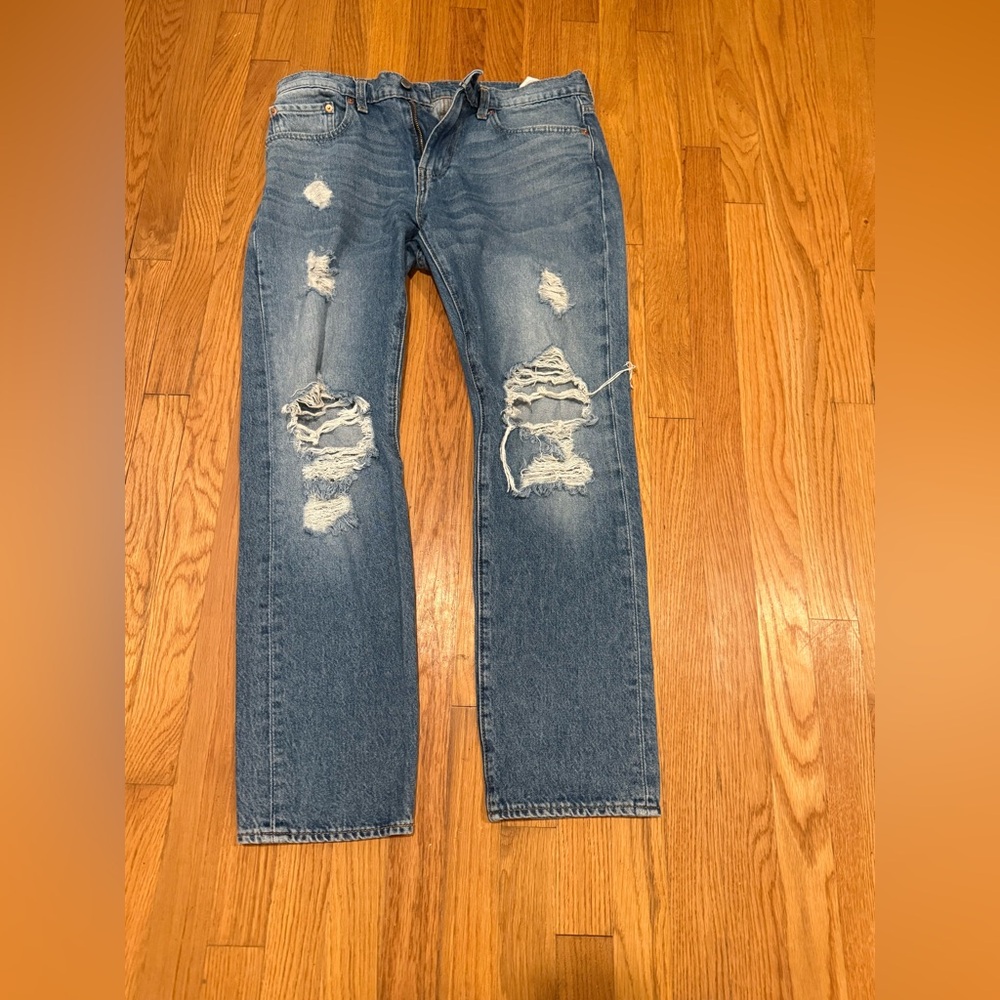 2 pair of Levis premium jeans and 1 pair of lucky brand jeans